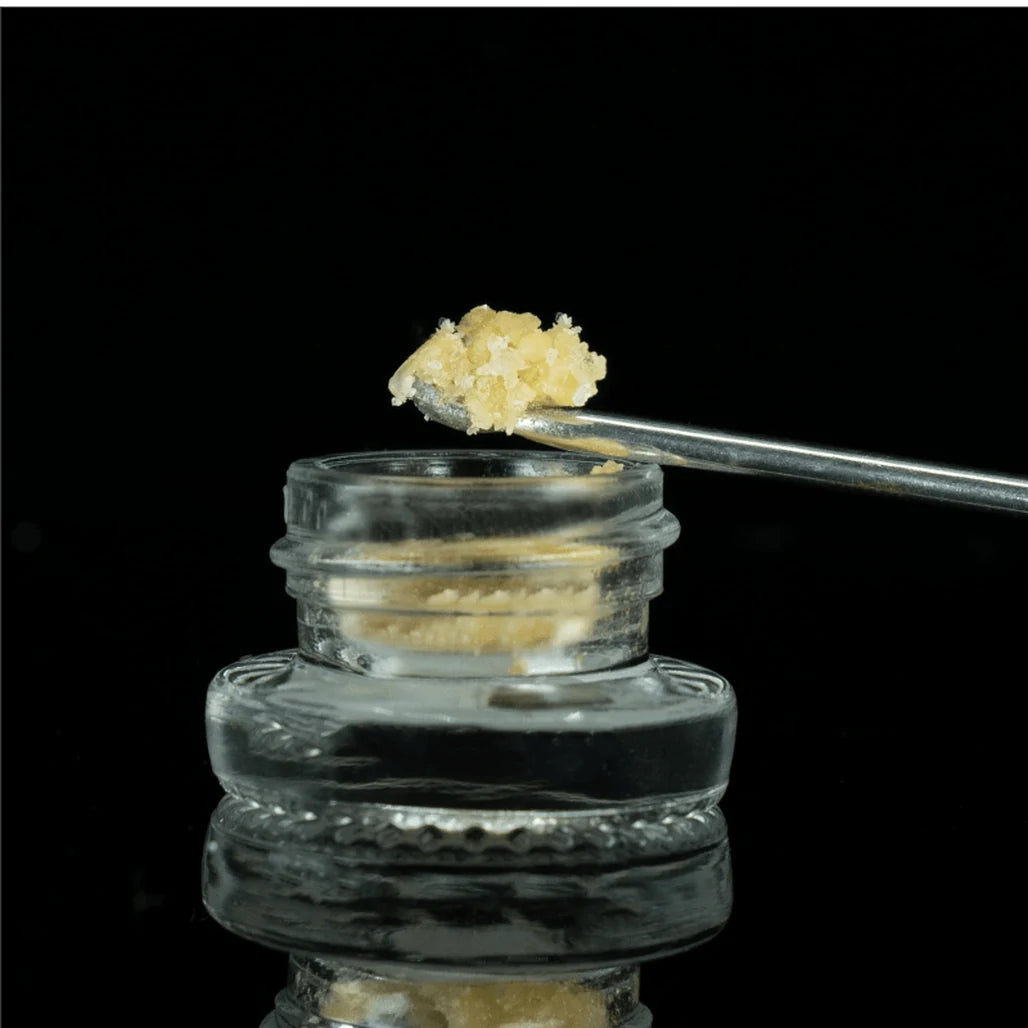 Elyxr THC-A sugar and budder concentrate texture